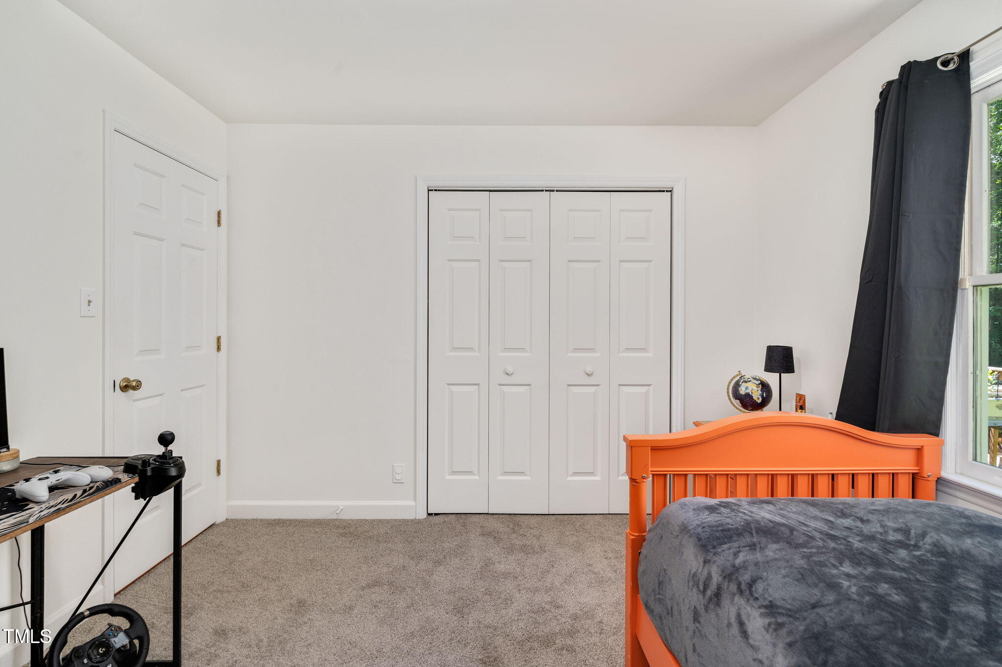 5320 Middleton Road Durham, NC 27713 - Photo 24 of 36 a bedroom with a bed and a table in it