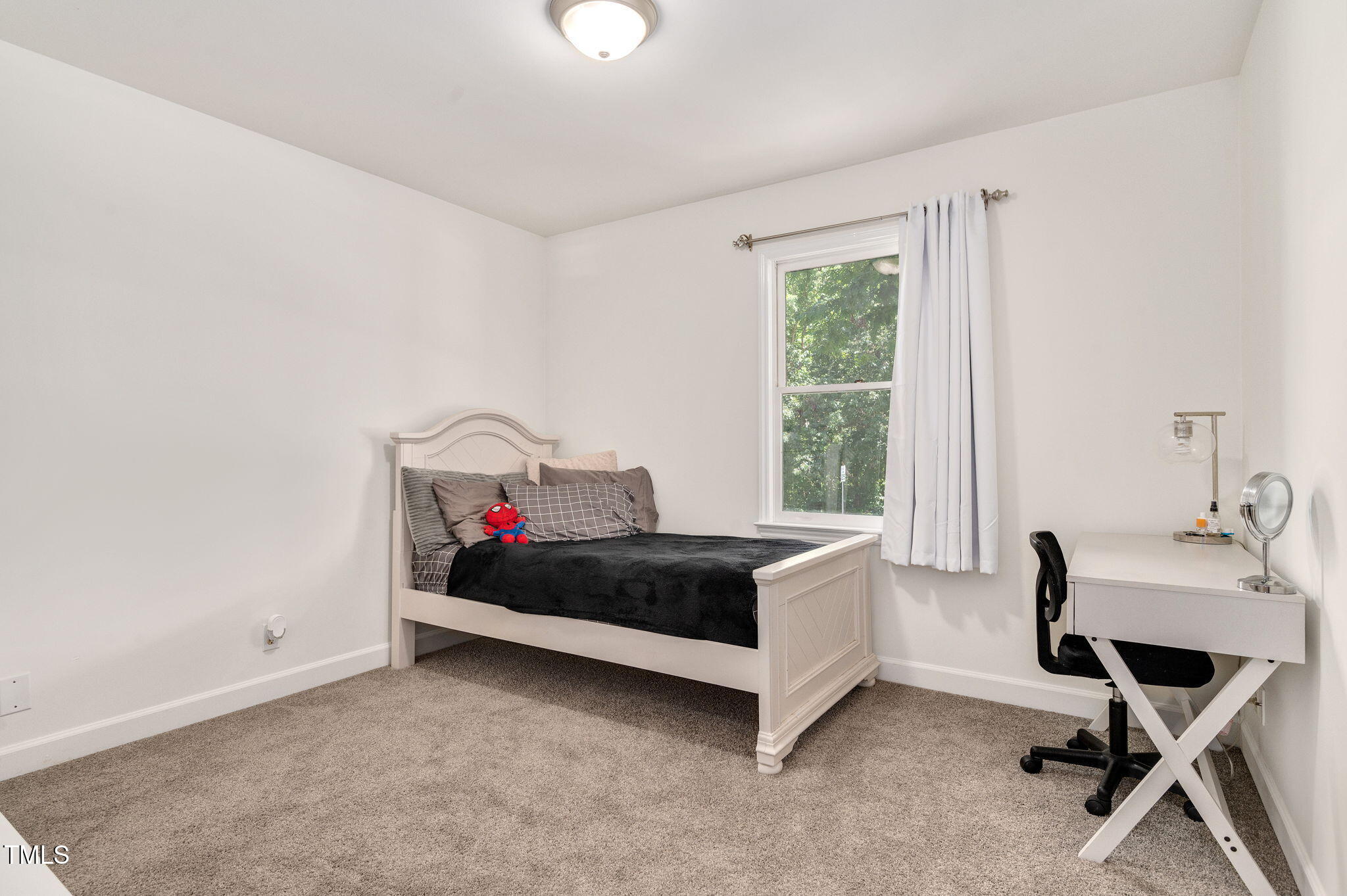 5320 Middleton Road Durham, NC 27713 - Photo 25 of 36 a bedroom with a bed and a window