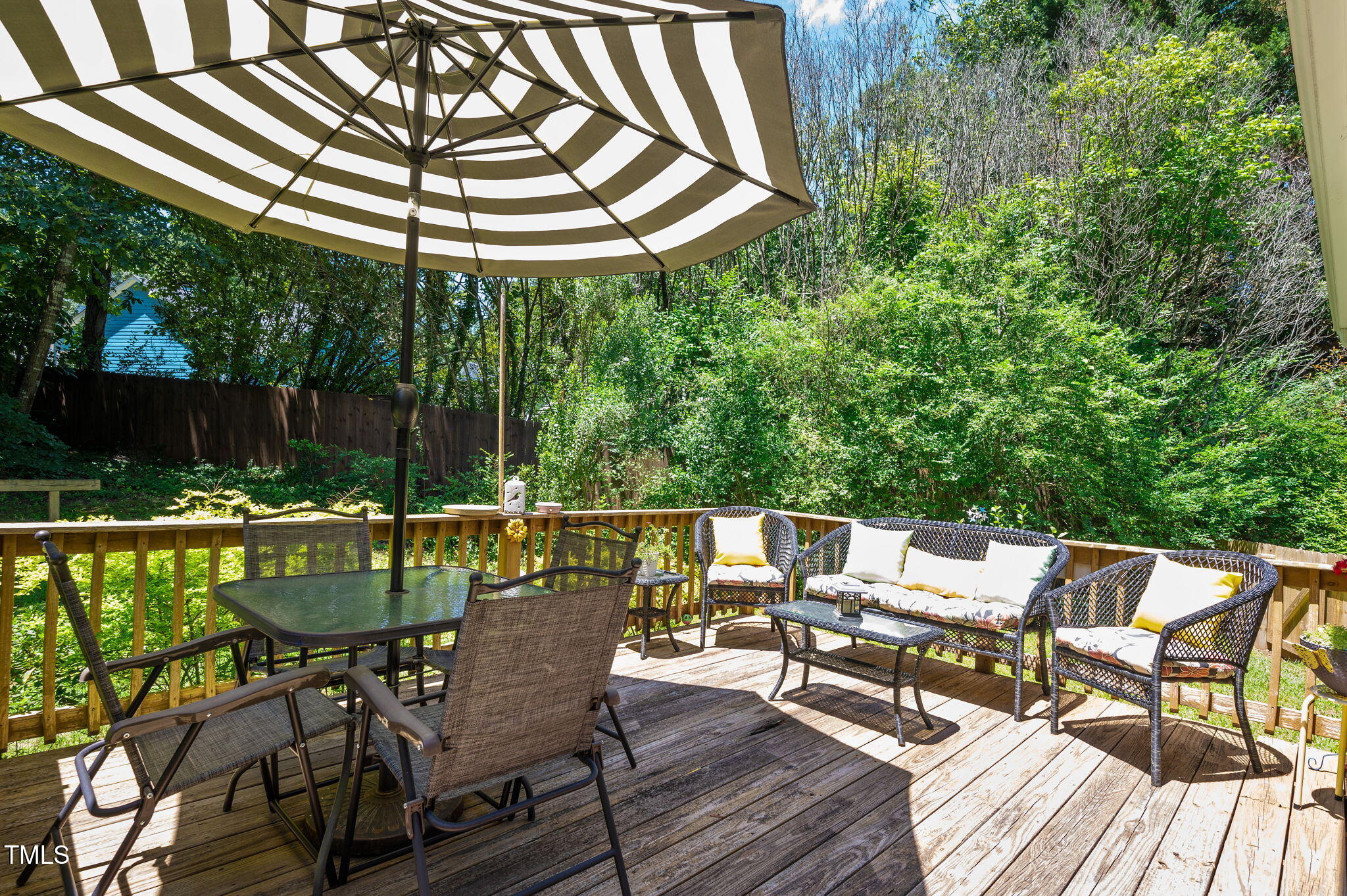 5320 Middleton Road Durham, NC 27713 - Photo 28 of 36 a patio with glass top table and chairs