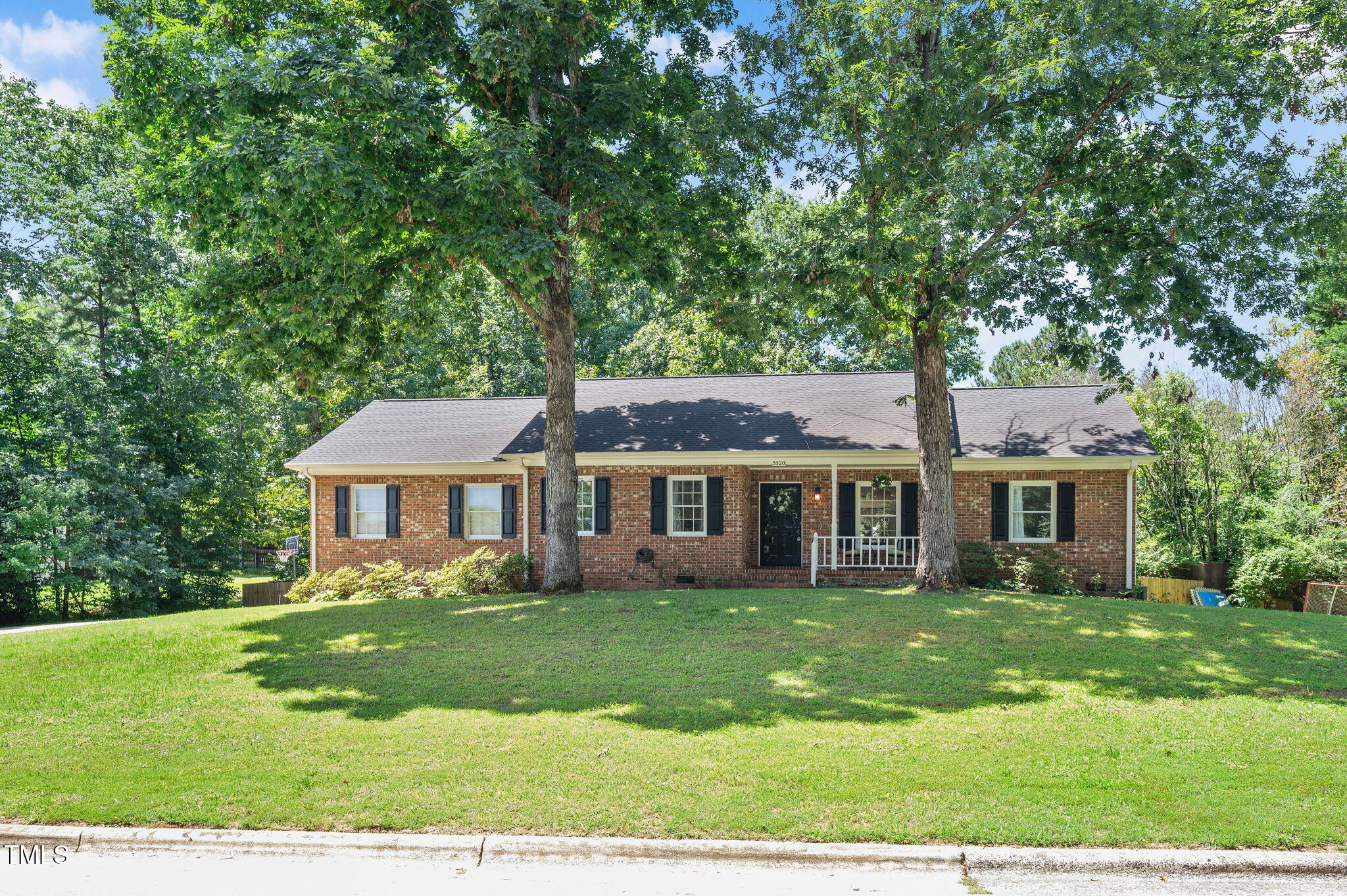 5320 Middleton Road Durham, NC 27713 - Photo 2 of 36 front view of a house with a yard