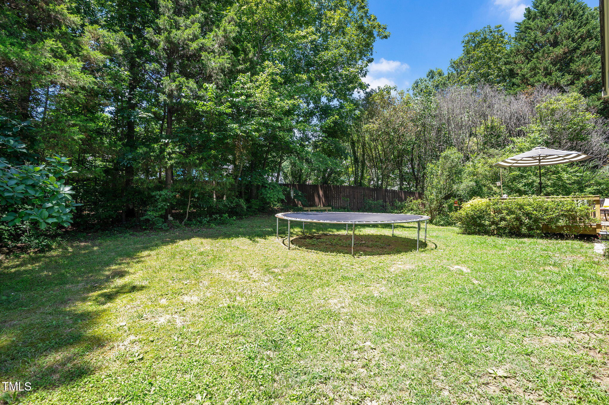 5320 Middleton Road Durham, NC 27713 - Photo 31 of 36 a swimming pool with trees in the background
