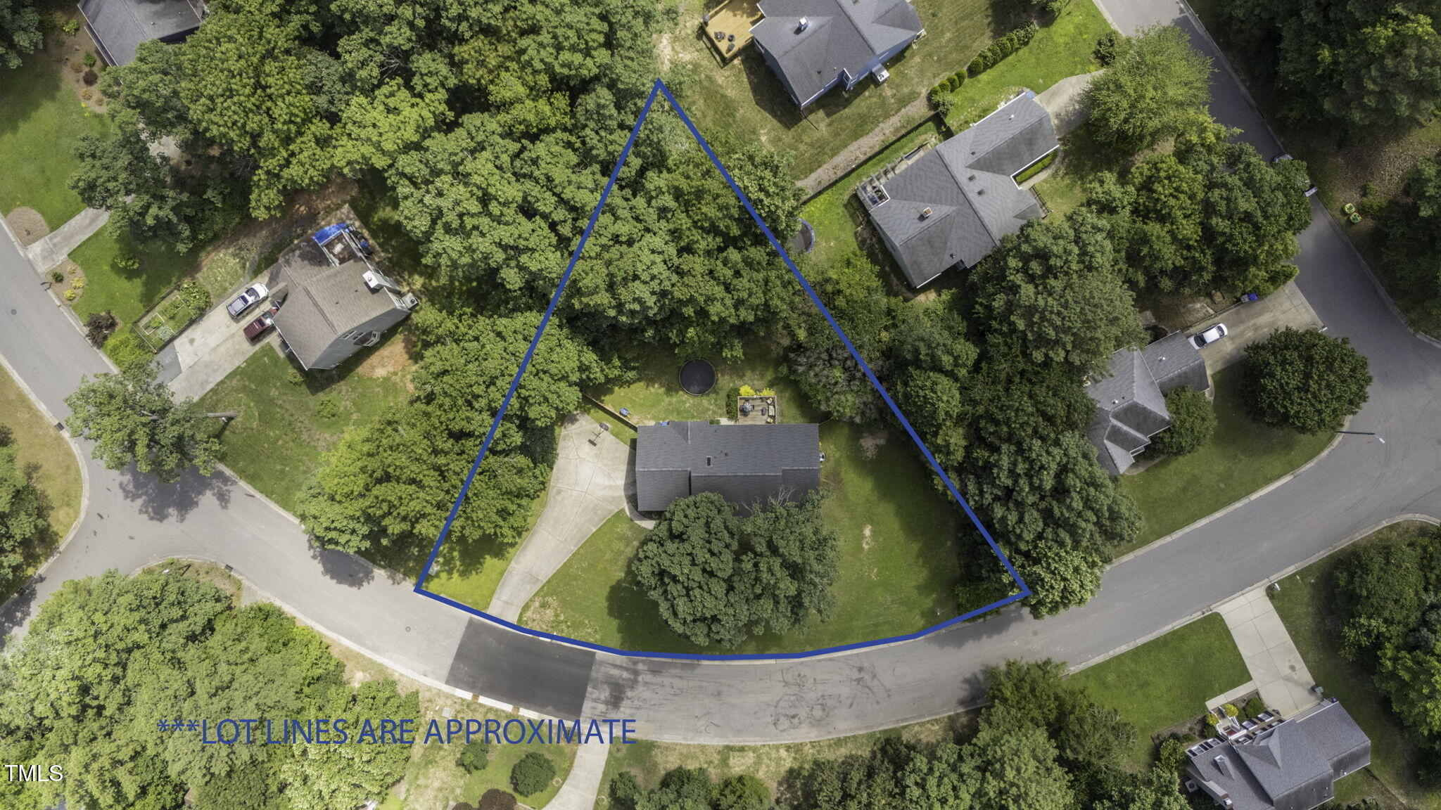 5320 Middleton Road Durham, NC 27713 - Photo 33 of 36 an aerial view of a house with a yard and green space