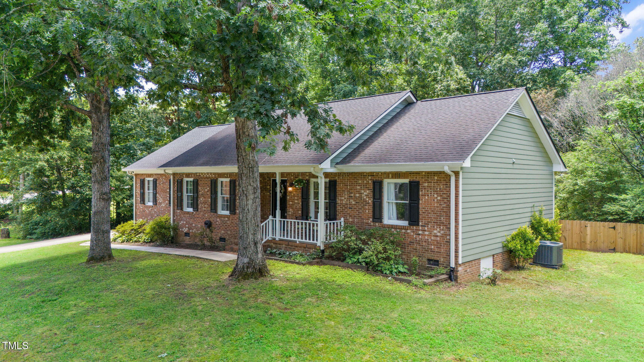 5320 Middleton Road Durham, NC 27713 - Photo 3 of 36 a front view of a house with a yard