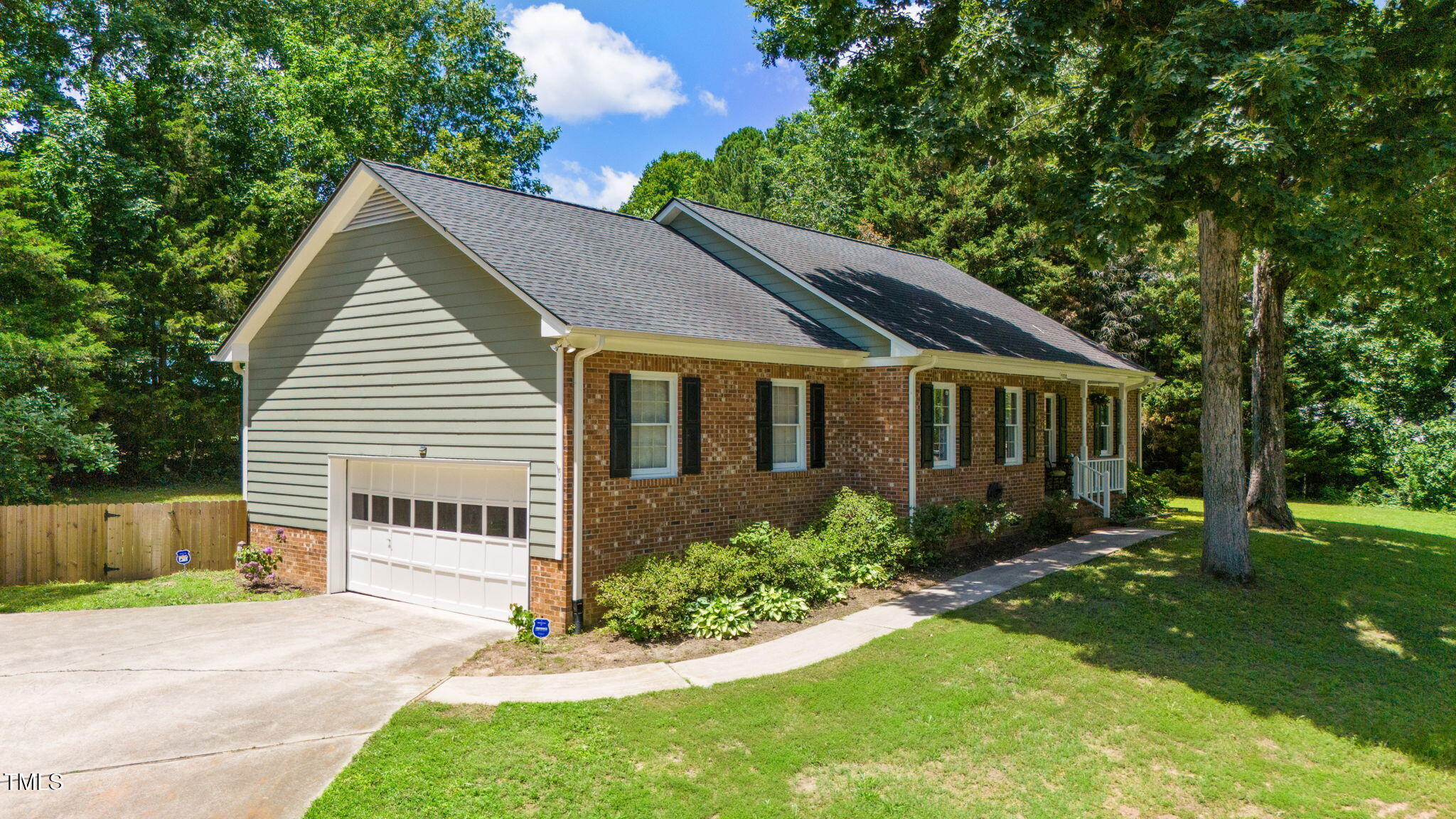 5320 Middleton Road Durham, NC 27713 - Photo 6 of 36 a front view of a house with a yard