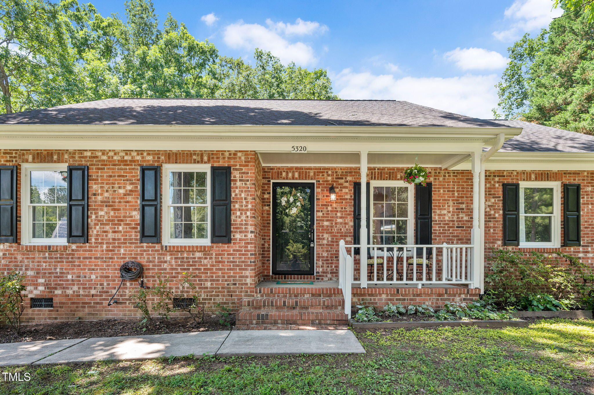 5320 Middleton Road Durham, NC 27713 - Photo 7 of 36 front view of a house with a yard