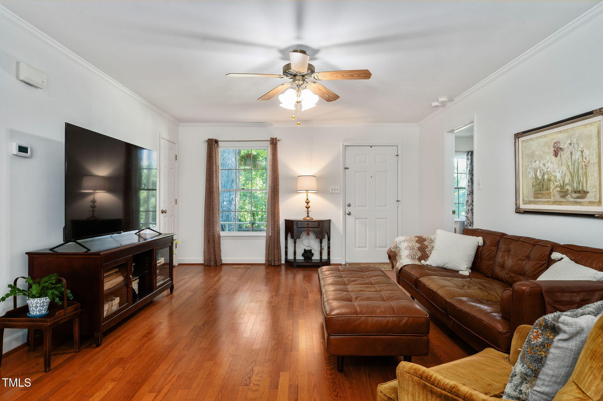 5320 Middleton Road Durham, NC 27713 - Photo 8 of 36 a living room with furniture and a flat screen tv