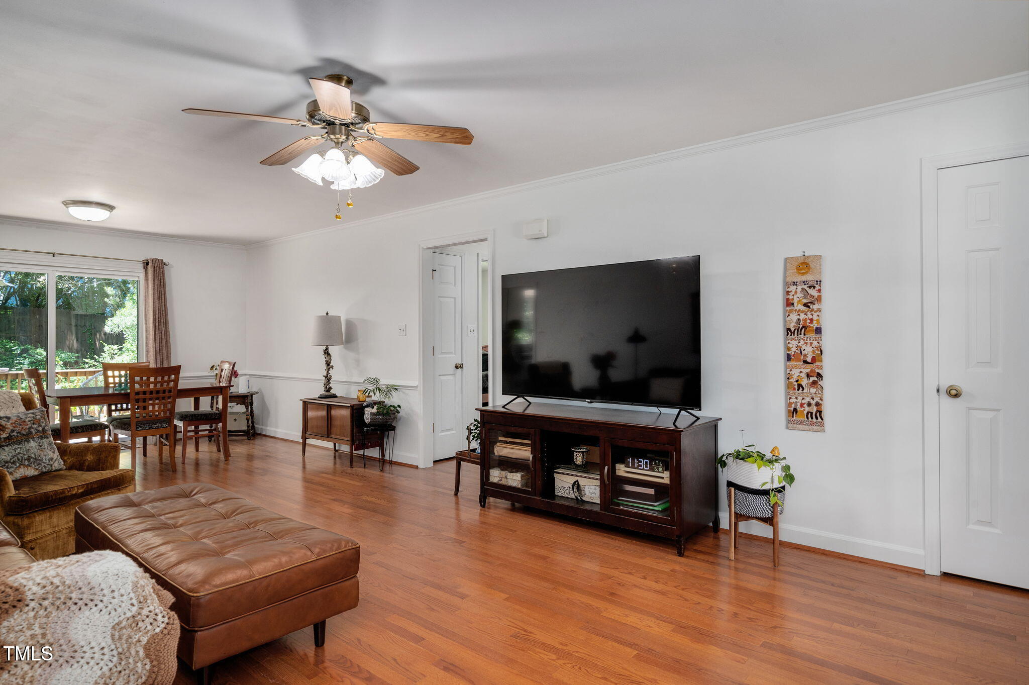 5320 Middleton Road Durham, NC 27713 - Photo 9 of 36 a living room with furniture and a flat screen tv