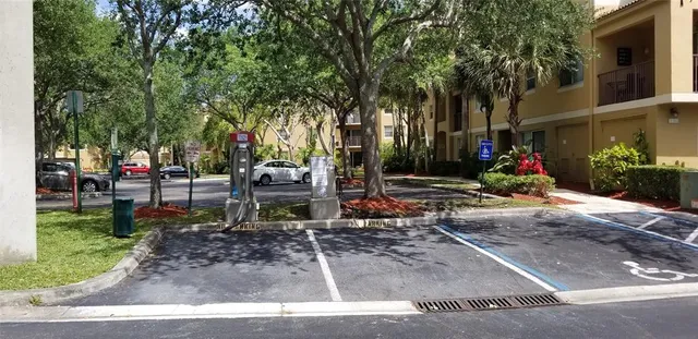 a backyard of a house with barbeque oven