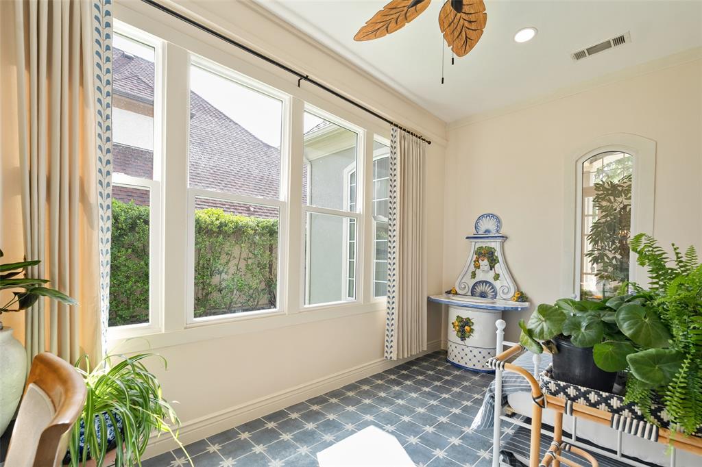 14725 Celestial Place Addison, TX 75254 - Photo 15 of 30 Enclosed Patio Serves as a Garden Room Filled with Natural Light