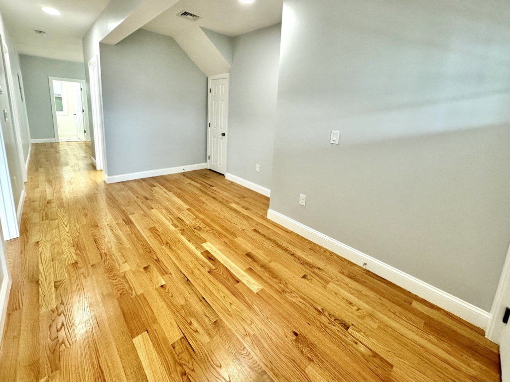 190 Hillside Street, Unit 1 Boston, MA 02120 - Photo 26 of 27 a view of a room with wooden floor