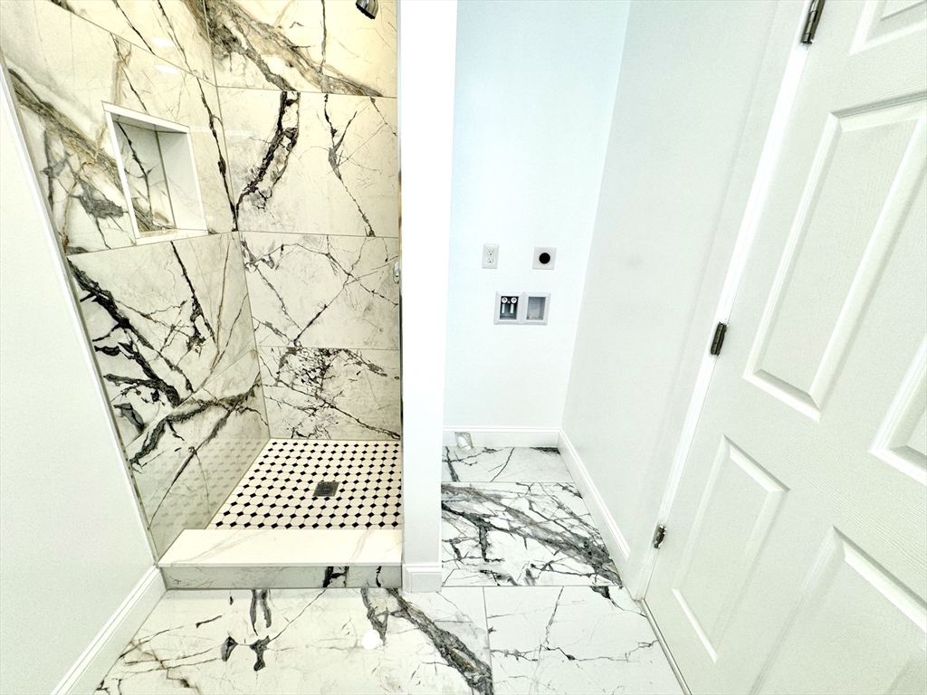 190 Hillside Street, Unit 1 Boston, MA 02120 - Photo 7 of 27 a bathroom with a sink and a toilet