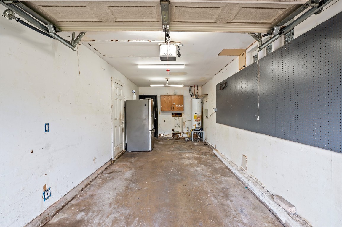 2308 Grape Lane Pasadena, TX 77502 - Photo 19 of 19 a view of a hallway with a chandelier