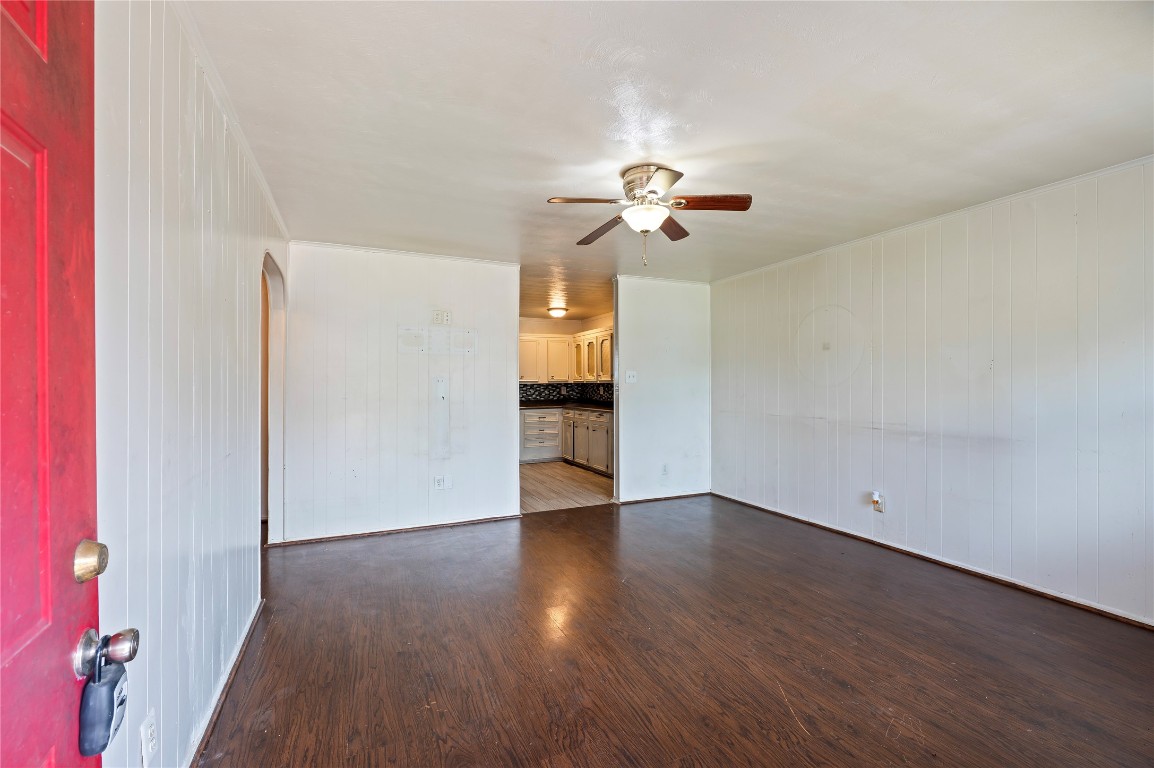 2308 Grape Lane Pasadena, TX 77502 - Photo 9 of 19 wooden floor in an empty room with a window