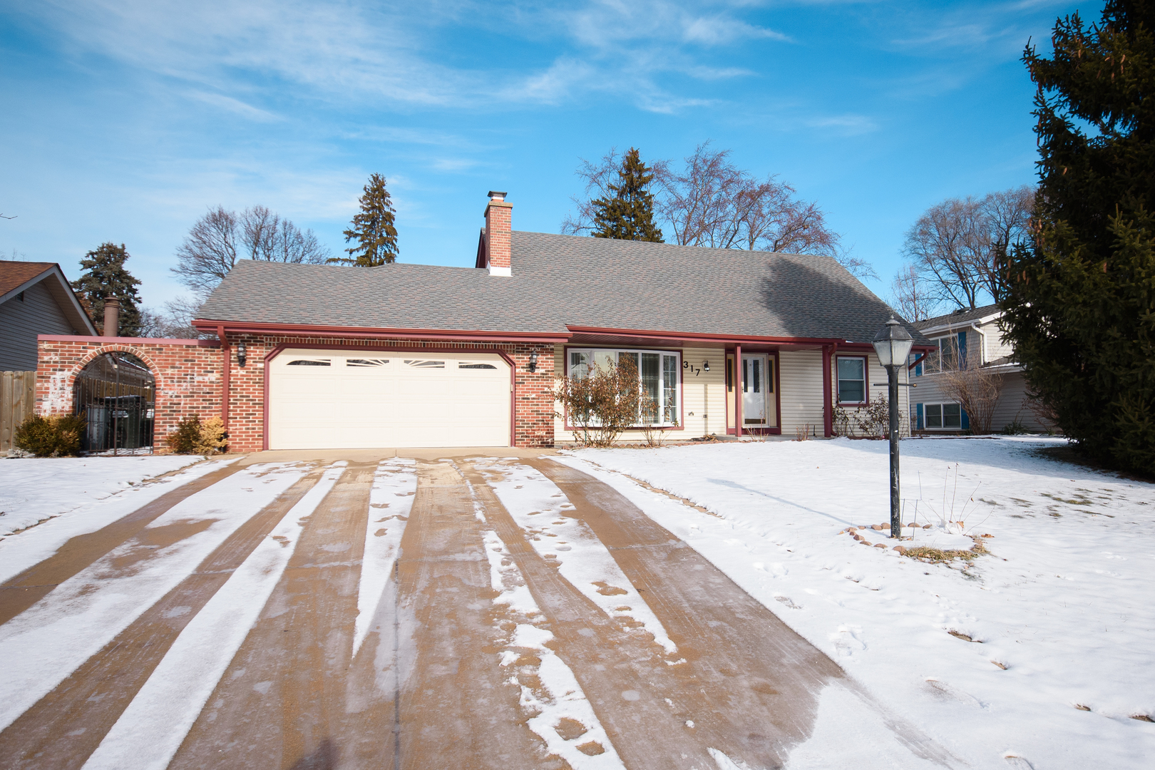 317 Arapahoe Trail Carol Stream, IL 60188 - Photo 1 of 16 a view of a house with a street