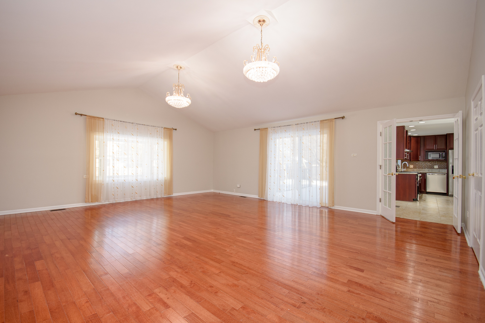 317 Arapahoe Trail Carol Stream, IL 60188 - Photo 6 of 16 a view of empty room with wooden floor