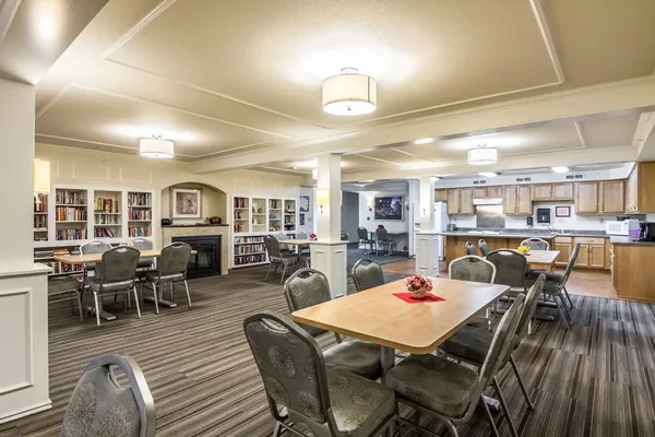 a outdoor space with lots of furniture and lots of chairs