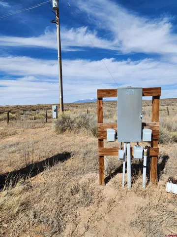 a view of a chairs and table in the patio