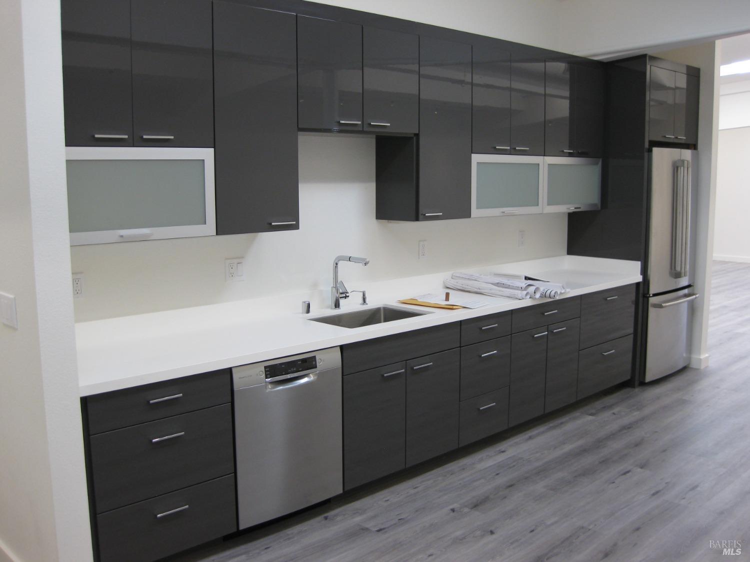 18615 Highway 12 Sonoma, CA 95476 - Photo 12 of 12 a spacious bathroom with a double vanity sink and mirror