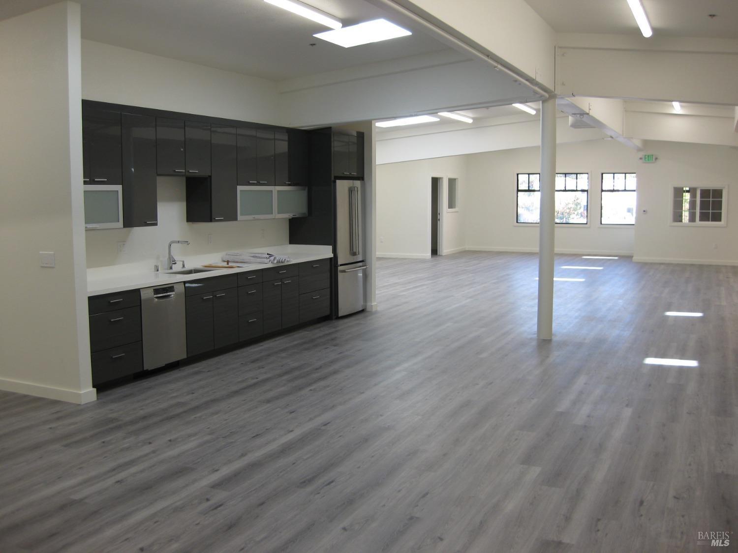 18615 Highway 12 Sonoma, CA 95476 - Photo 6 of 12 a large kitchen with stainless steel appliances granite countertop a large counter top and sink