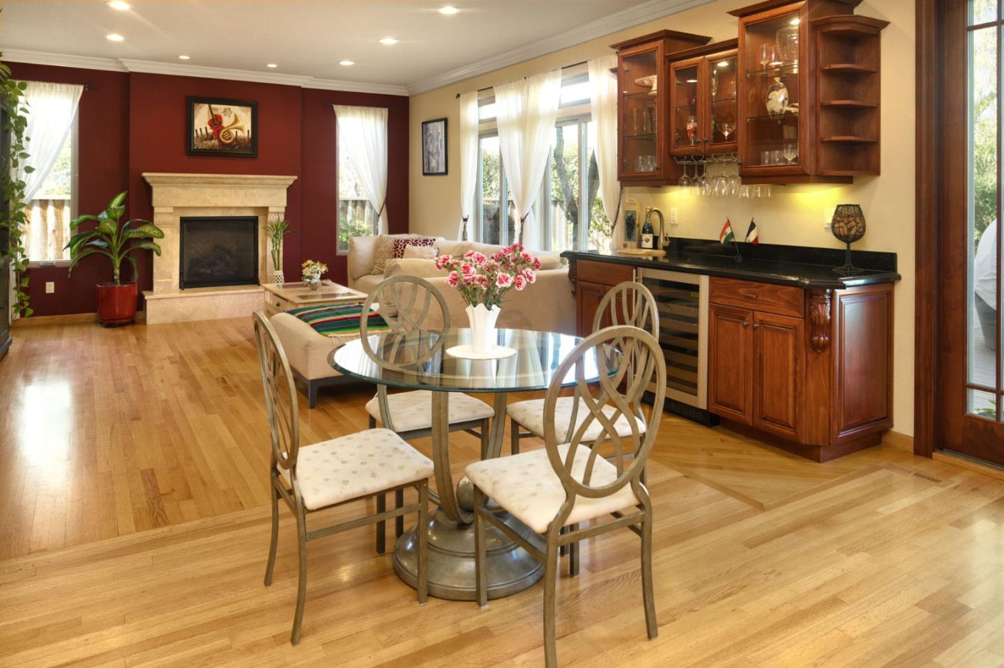 1127 Carnforth Court San Jose, CA 95120 - Photo 17 of 55 a dining room with furniture and a fireplace