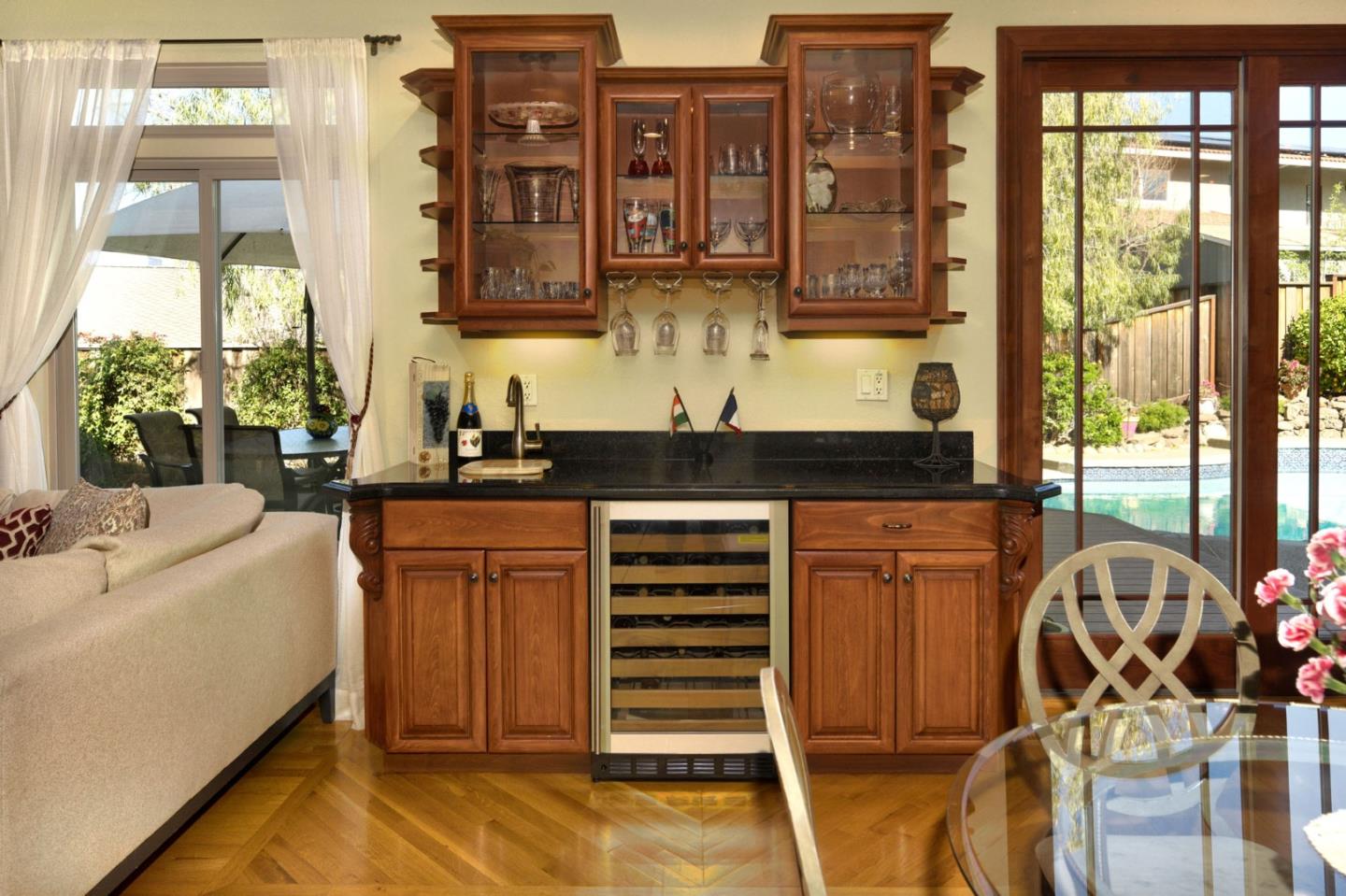 1127 Carnforth Court San Jose, CA 95120 - Photo 19 of 55 a kitchen with stainless steel appliances granite countertop a stove and a sink