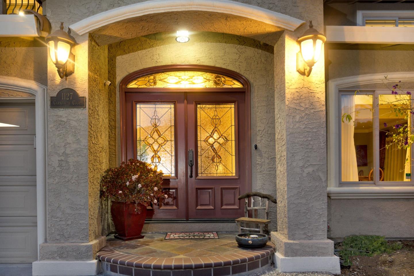 1127 Carnforth Court San Jose, CA 95120 - Photo 2 of 55 a front view of a house with a porch