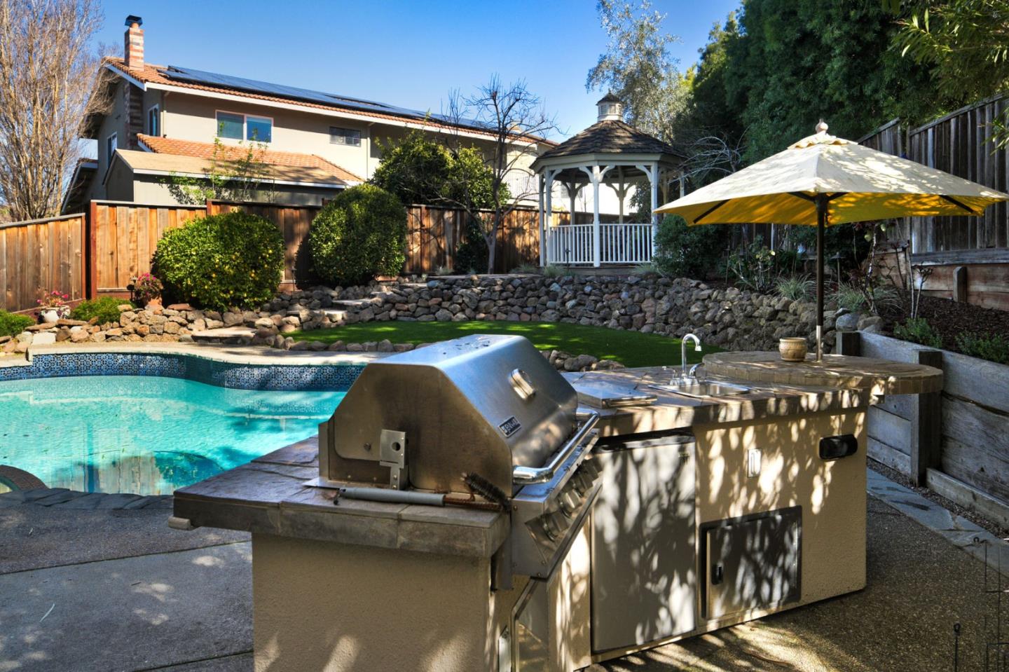 1127 Carnforth Court San Jose, CA 95120 - Photo 36 of 55 an outdoor space with furniture and umbrella