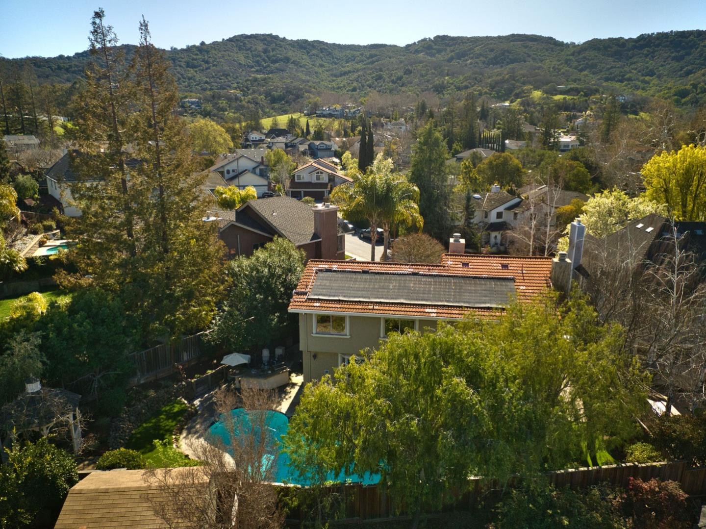 1127 Carnforth Court San Jose, CA 95120 - Photo 48 of 55 a view of a city with lush green forest