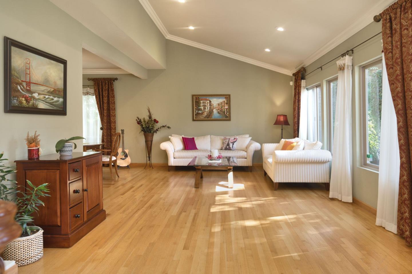 1127 Carnforth Court San Jose, CA 95120 - Photo 6 of 55 a bedroom with furniture and a wooden floor