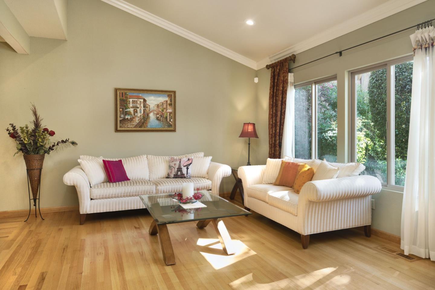 1127 Carnforth Court San Jose, CA 95120 - Photo 7 of 55 a living room with furniture and a large window