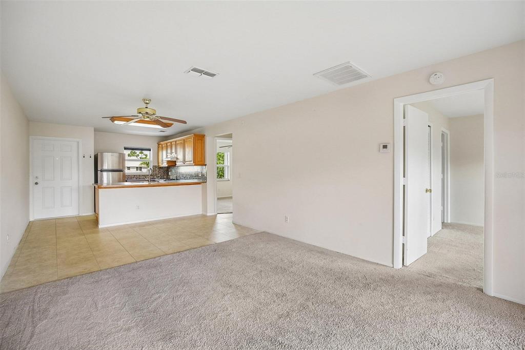 26485 Rampart Boulevard, Unit A27 Punta Gorda, FL 33983 - Photo 25 of 27 a view of a kitchen and a window