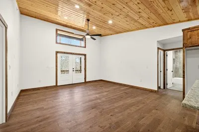 a view of an empty room with a window