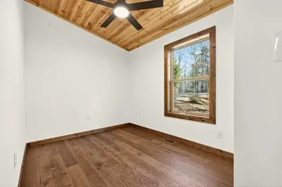 a view of a room that has a window in it