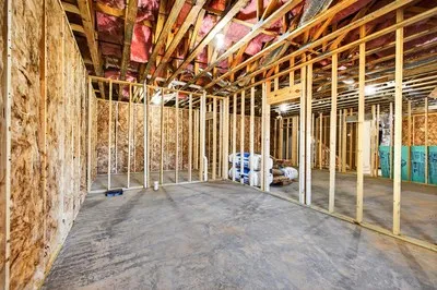 a view of a room with wooden walls