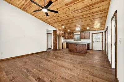 a view of a livingroom with wooden floor