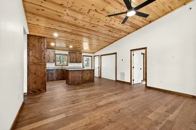 a view of a livingroom with wooden floor