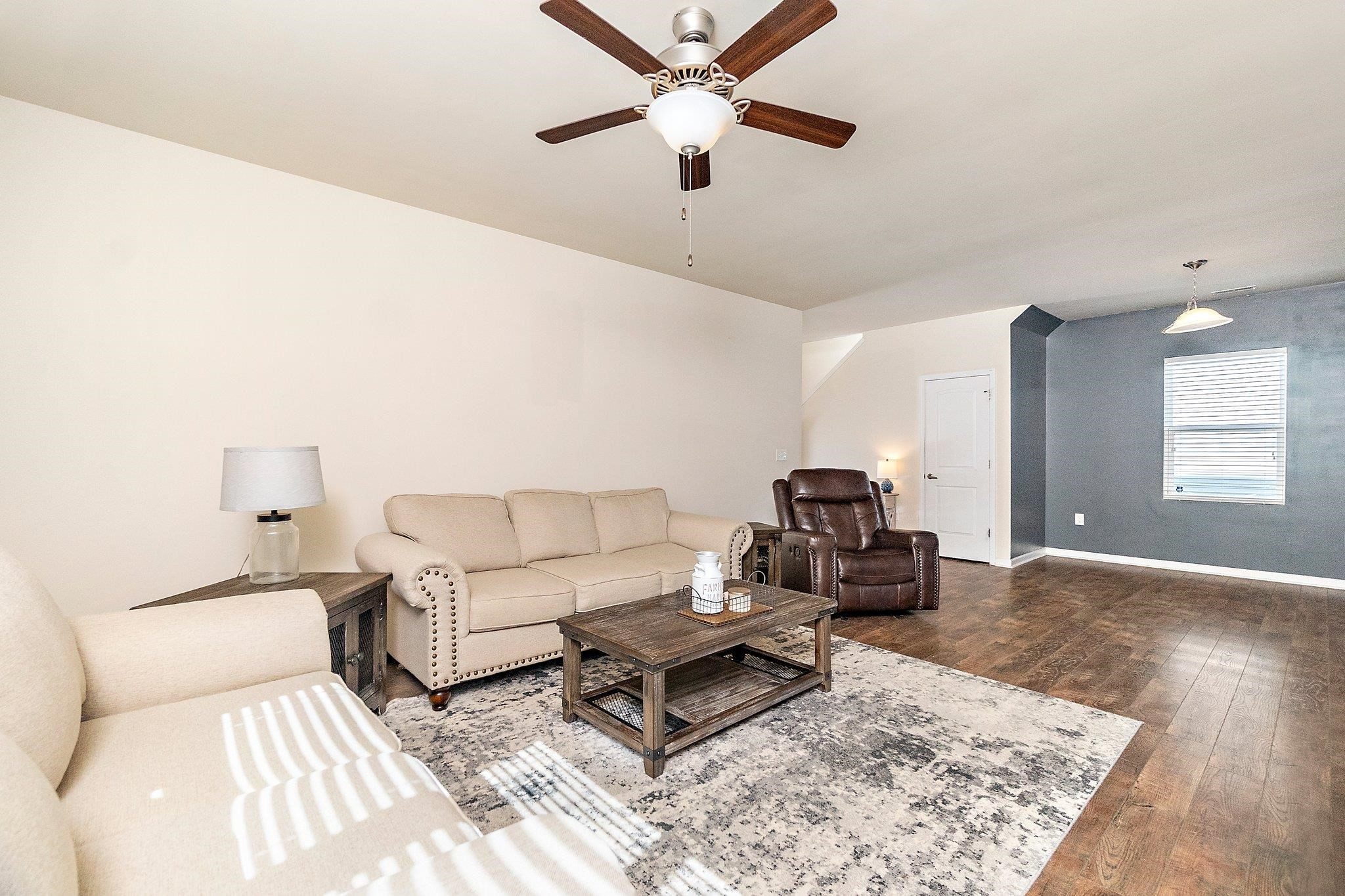3525 Althorp Drive Raleigh, NC 27616 - Photo 11 of 28 a living room with furniture and a rug