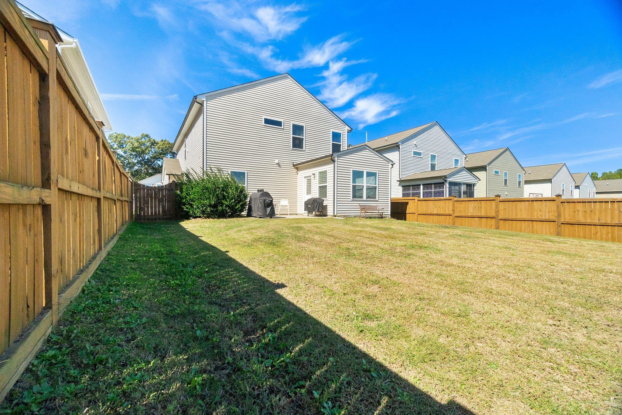 3525 Althorp Drive Raleigh, NC 27616 - Photo 25 of 28 a view of residential houses with yard and swimming pool