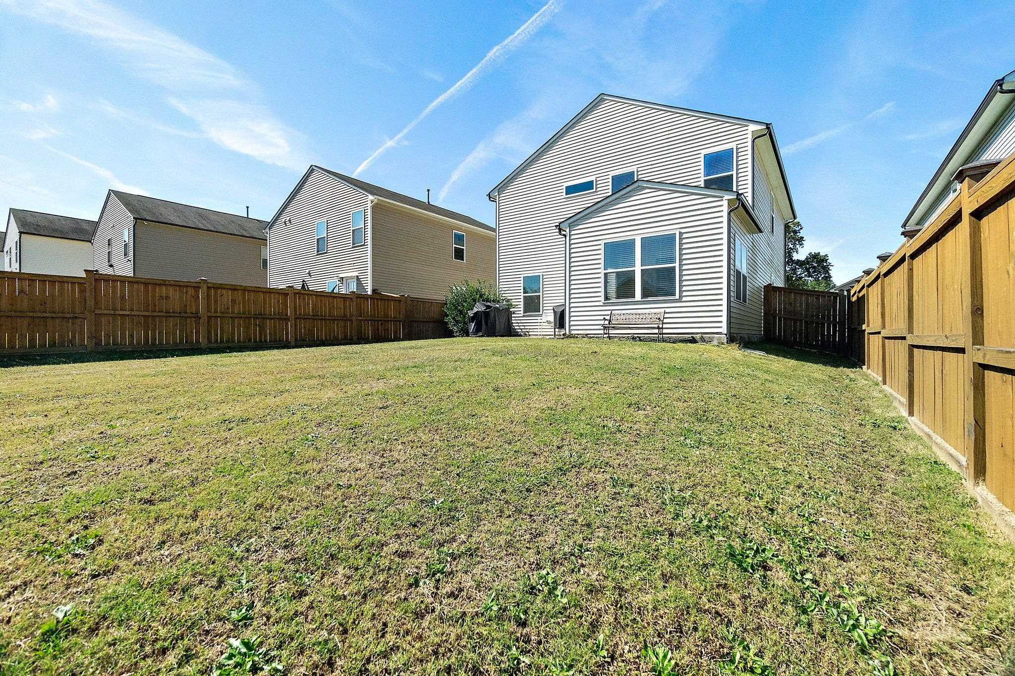 3525 Althorp Drive Raleigh, NC 27616 - Photo 26 of 28 a front view of a house with a yard