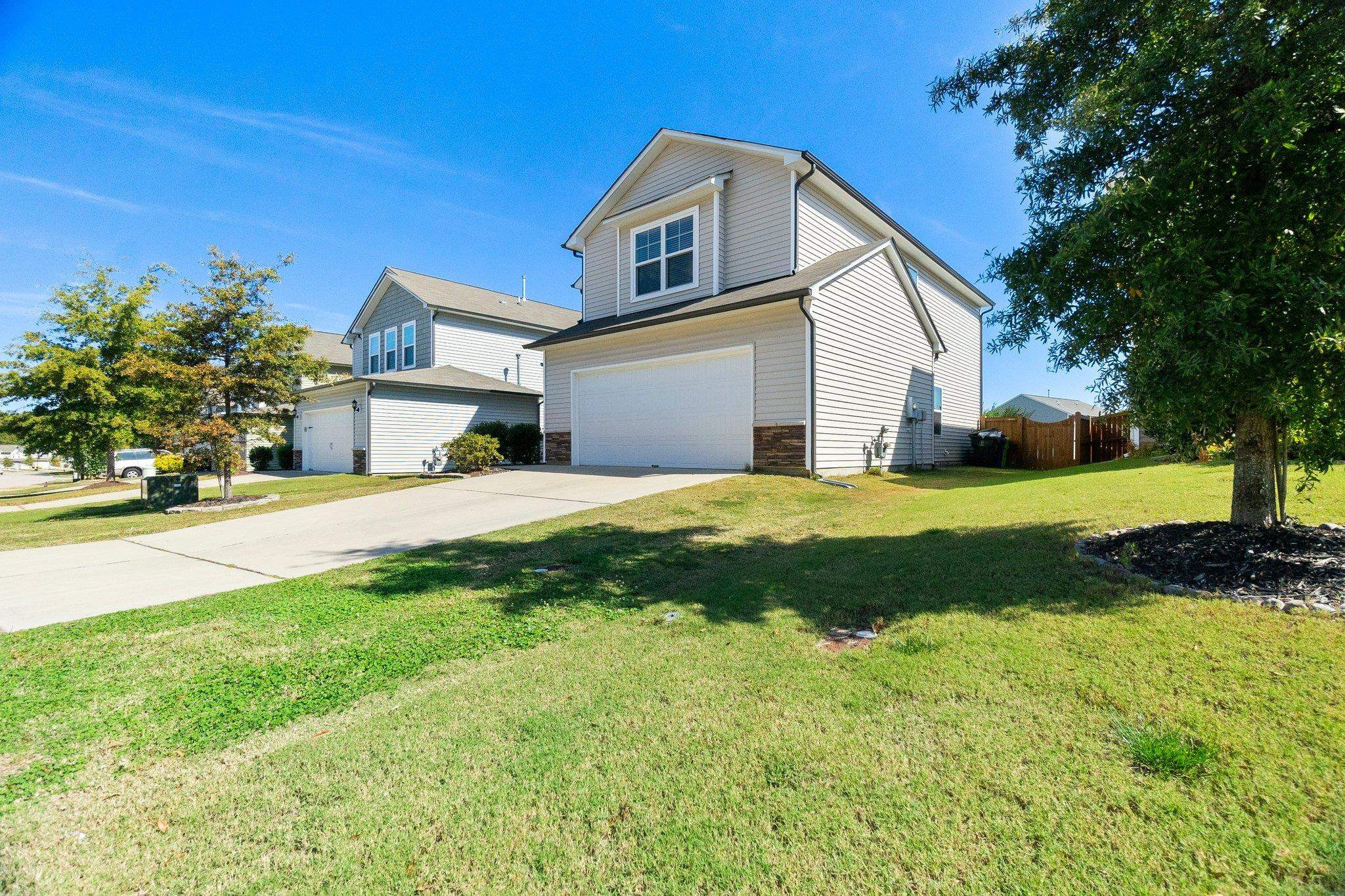 3525 Althorp Drive Raleigh, NC 27616 - Photo 3 of 28 a front view of a house with yard and green space
