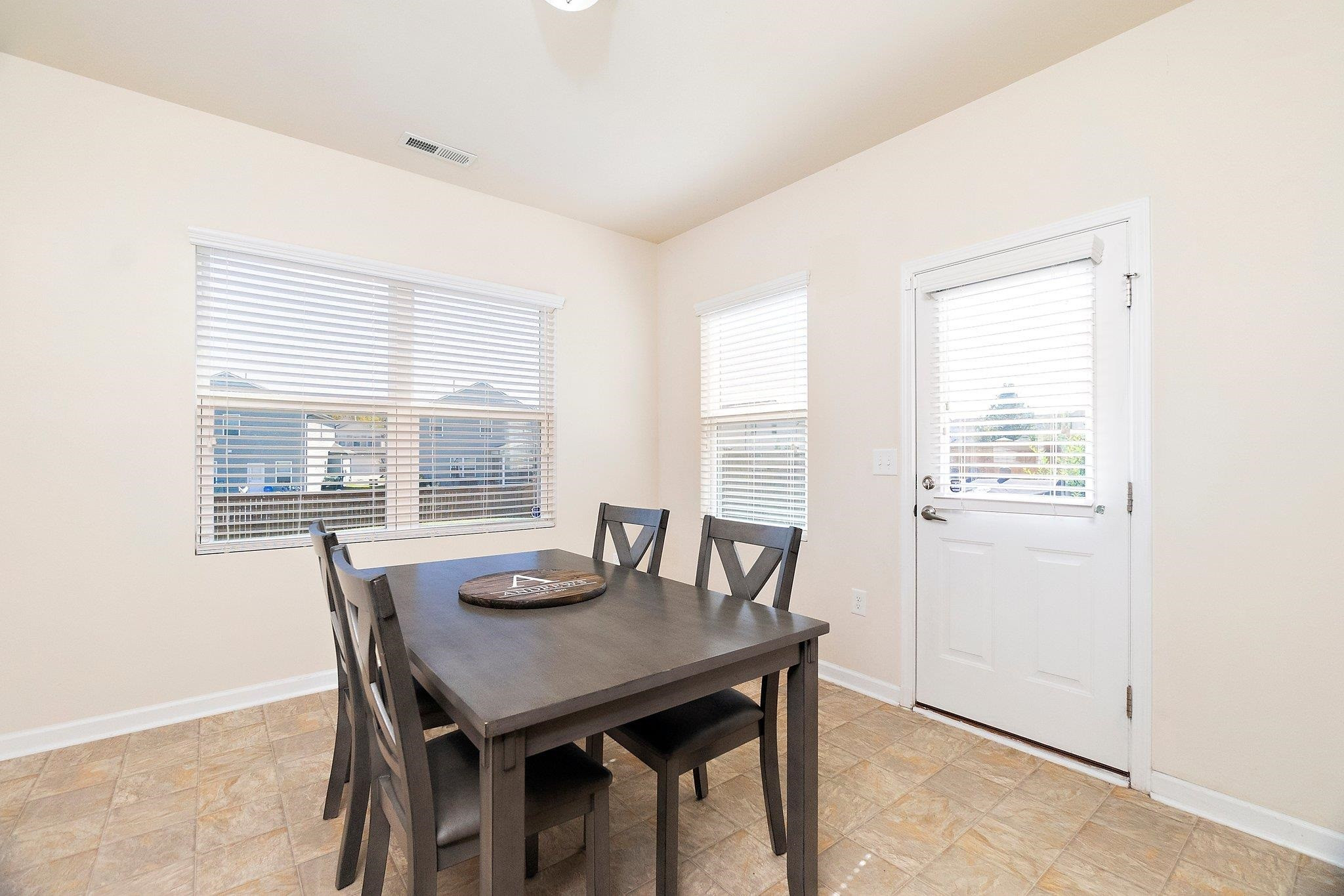 3525 Althorp Drive Raleigh, NC 27616 - Photo 8 of 28 a view of a dining room with furniture and window
