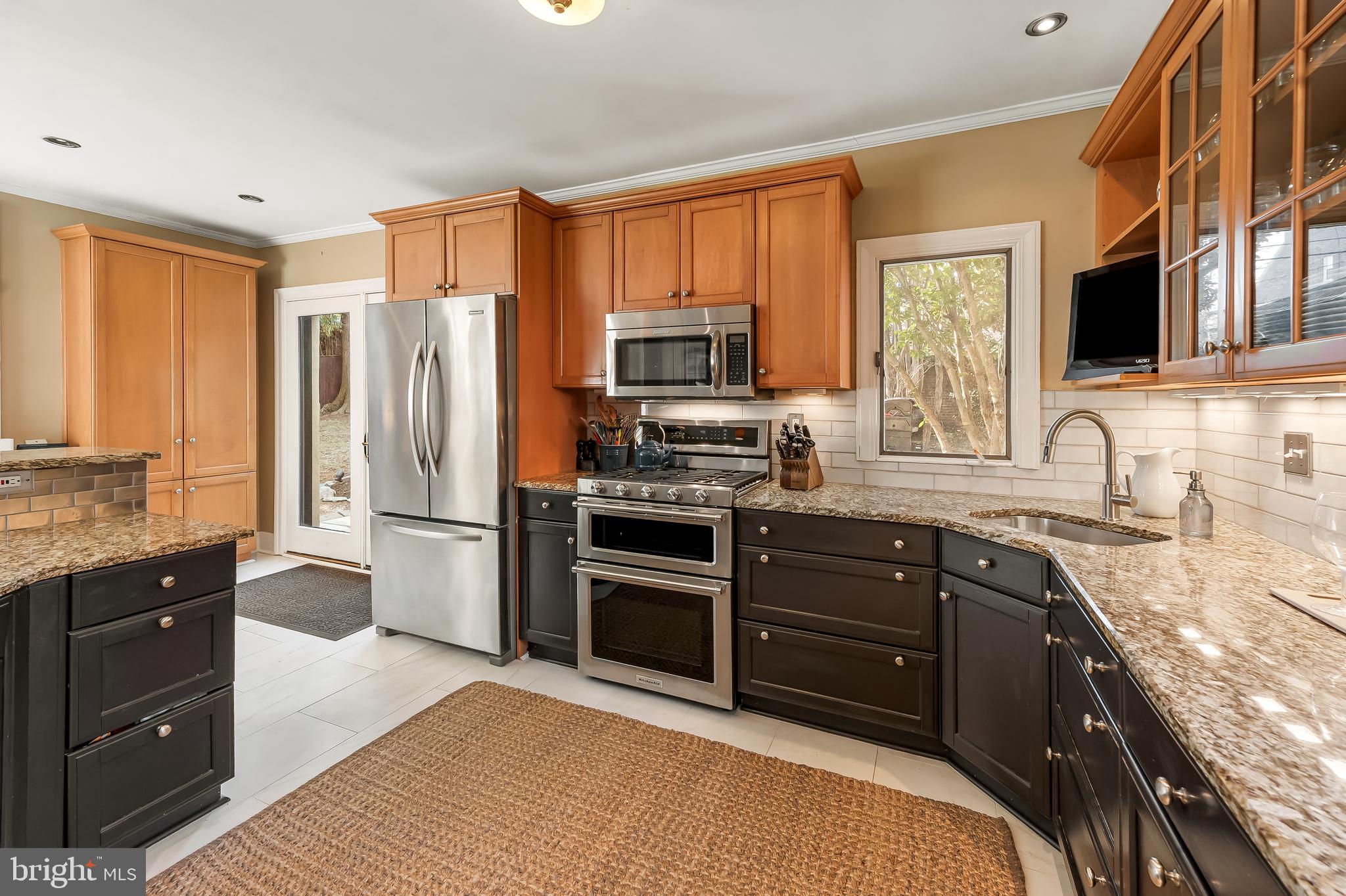 216 Wendover Road Baltimore, MD 21218 - Photo 24 of 83 Porcelain floors & backsplash! Stove w/double oven