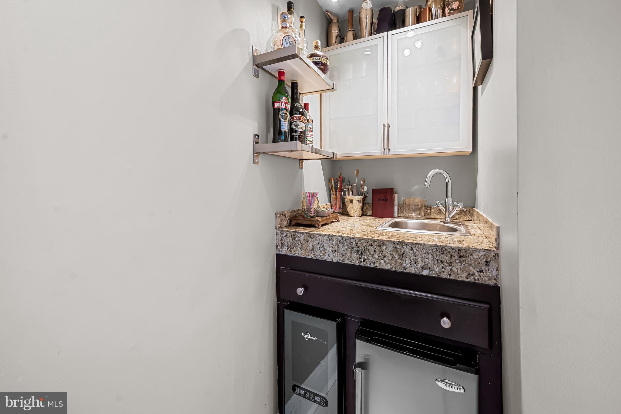 216 Wendover Road Baltimore, MD 21218 - Photo 27 of 83 Butler's Panty w/wet bar & wine refrigerator