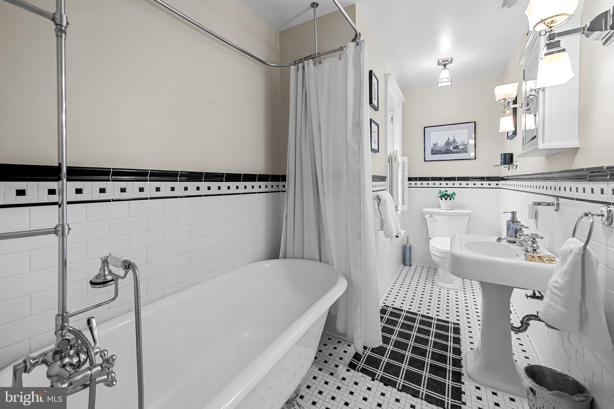 216 Wendover Road Baltimore, MD 21218 - Photo 38 of 83 Full bath on second level w/claw foot tub/shower