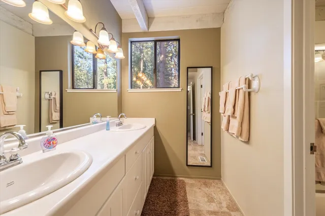 a bathroom with a shower and toilet