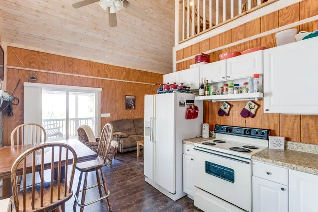 a view of room with furniture and a window