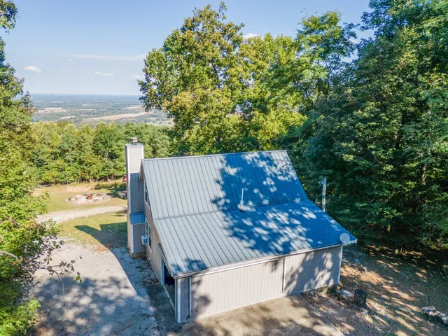 a view of a lake with a house