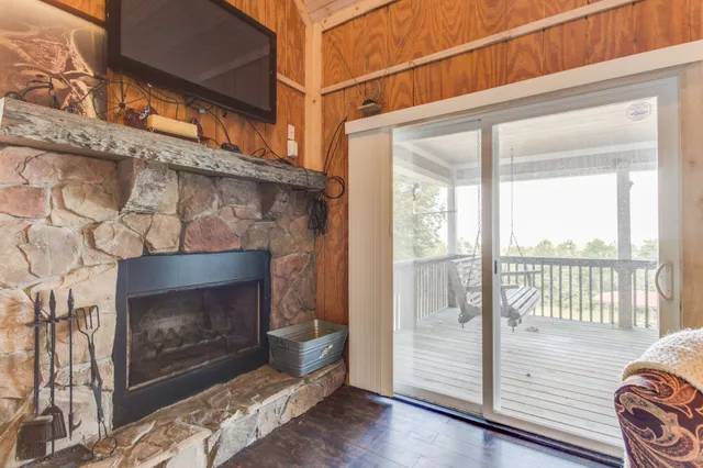 a living room with a fireplace