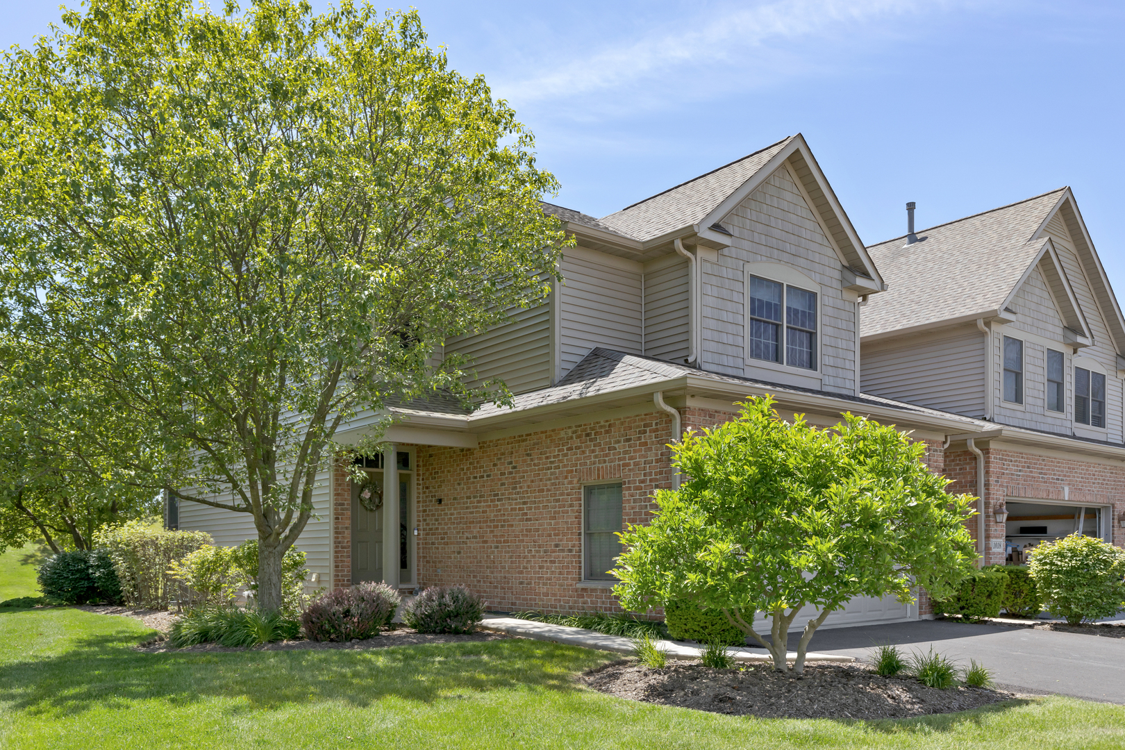 1016 Inverness Drive Antioch, IL 60002 - Photo 1 of 24 front view of a house with a yard