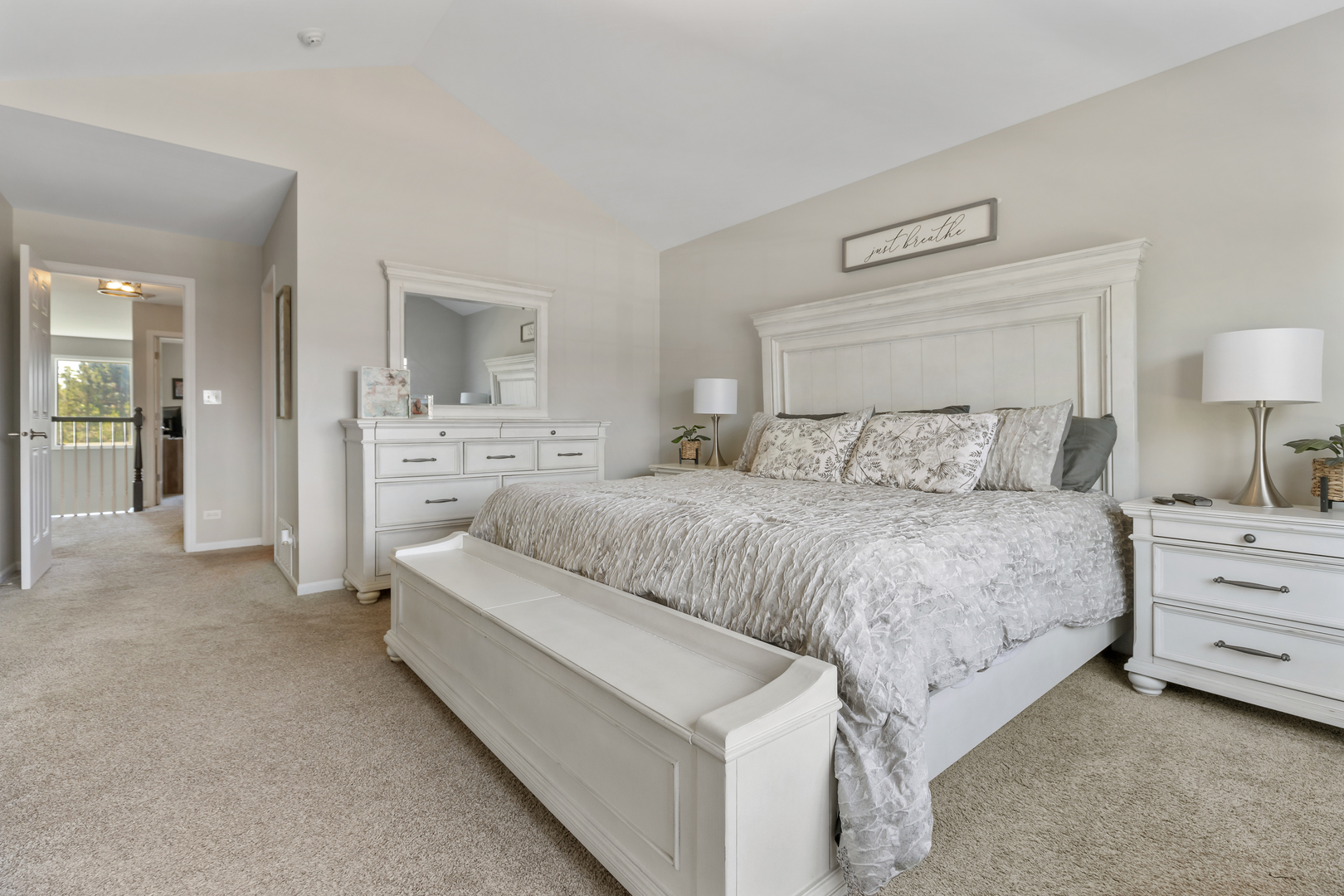 1016 Inverness Drive Antioch, IL 60002 - Photo 13 of 24 a bedroom with a bed and a lamp